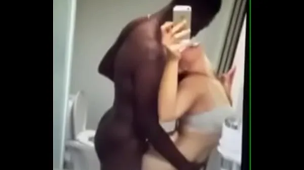 XXX White woman records herself with a black dick čerstvé videá
